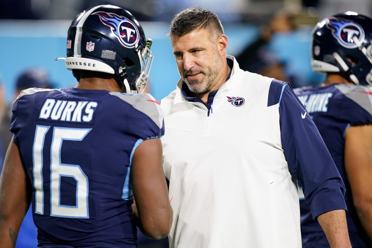 Tennessee Titans head coach Mike Vrabel speaks with wide receiver Treylon Burks (16) before a game against the Dallas Cowboys at Nissan Stadium Thursday, Dec. 29, 2022, in Nashville, Tenn.